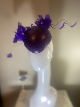 Purple leather hat with feather flower 