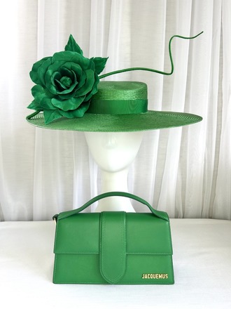 Green boater with removable flower