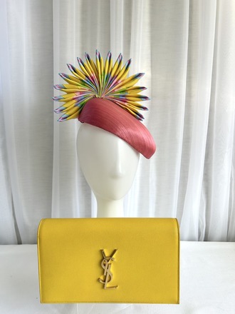 Rainbow pinwheel face hugger with pink abaca base