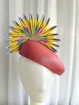 Rainbow pinwheel face hugger with pink abaca base
