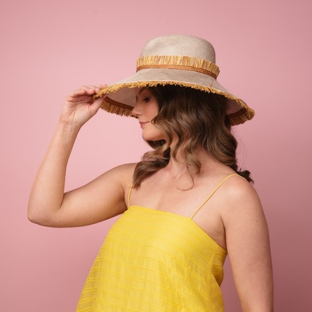 Moraka natural straw wide brimed hat with tassel trim edge S