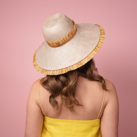 Moraka natural straw wide brimed hat with tassel trim edge S