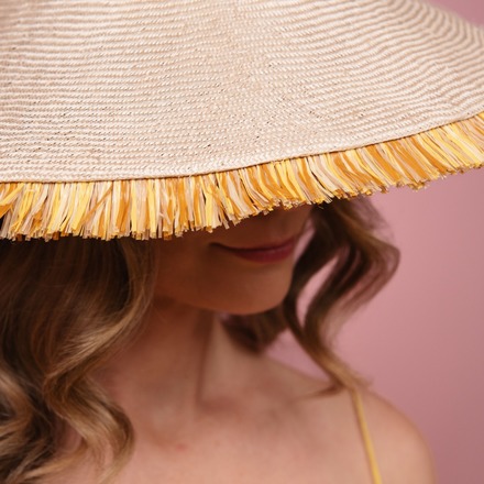 Moraka natural straw wide brimed hat with tassel trim edge S